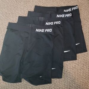 Four pairs of NIKE PRO Compression shorts